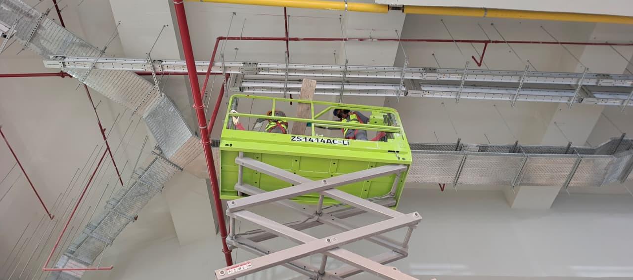 Cable tray installation at height – Waves Telecom project