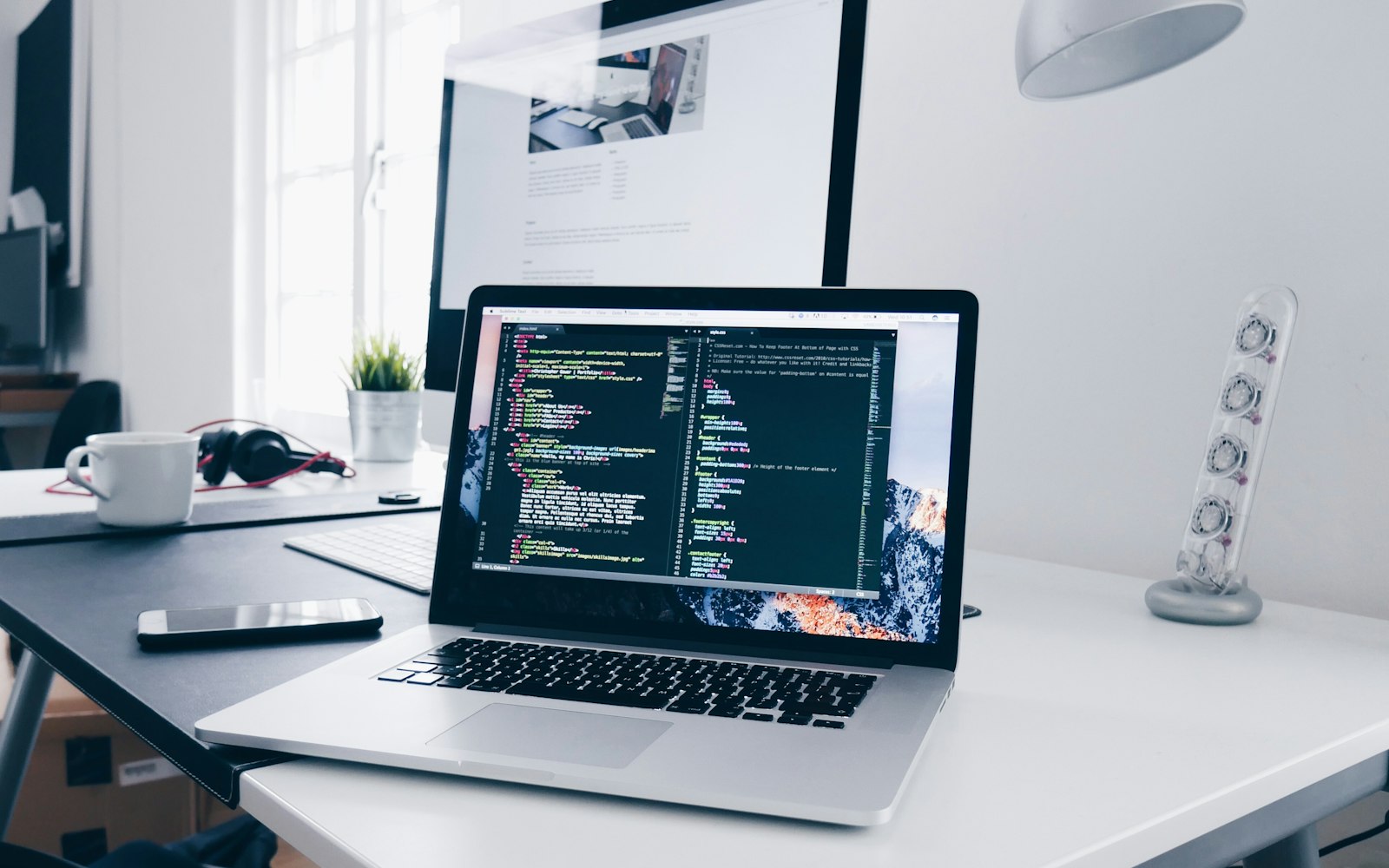 IT engineer configuring security policies on a laptop
