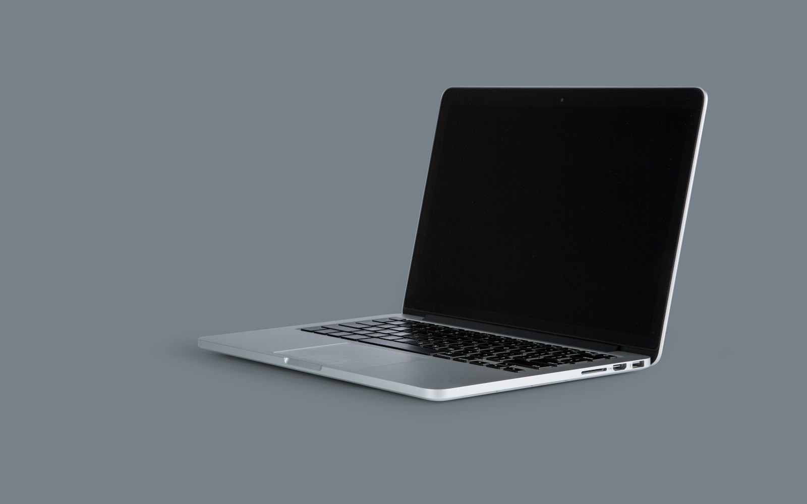 Open laptop on a desk used to manage cloud user accounts