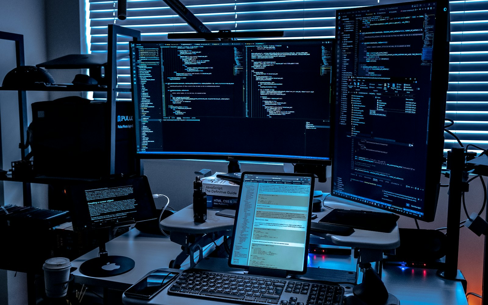 Security monitoring desk with several screens