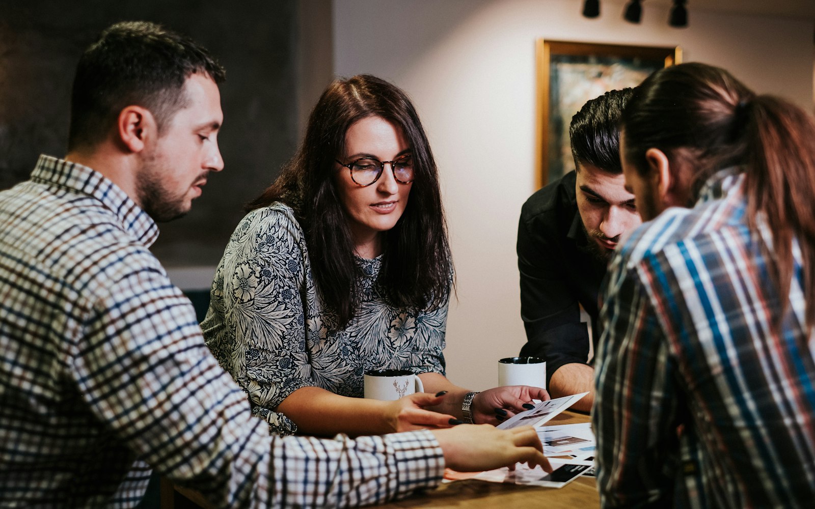 Business team reviewing a cybersecurity compliance plan